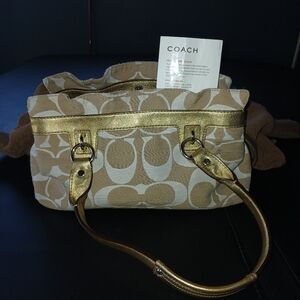 Coach penelope handbag! 14 inches wide, 8 inches tall. Bronze/tan.